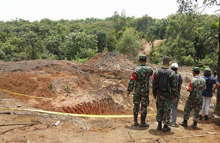 Heavy Rain Causes Fatal Landslide At Coal Mine In Indonesia