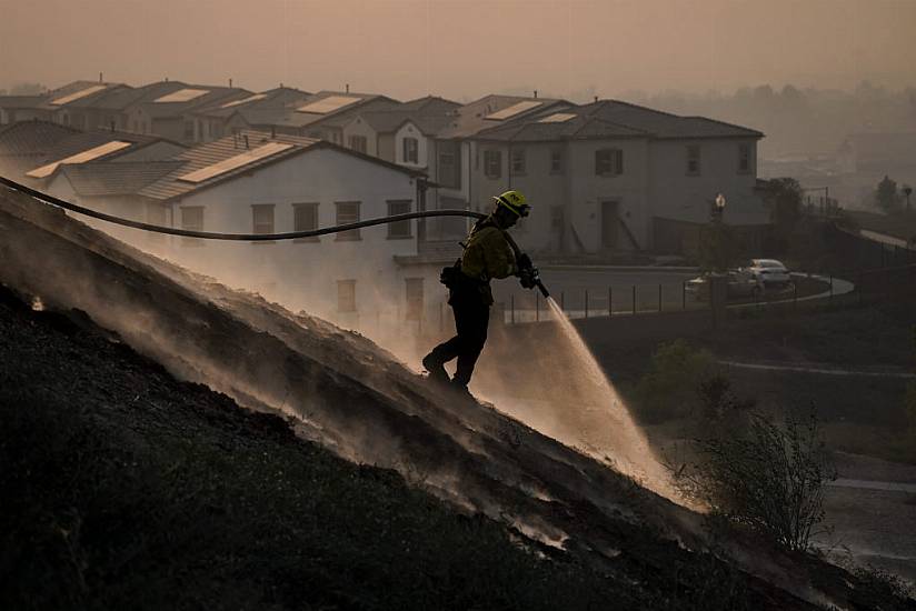 Tens Of Thousands Evacuated As Crews Battle California Wildfires