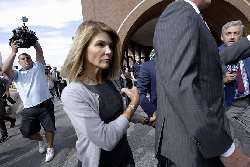 Actress Lori Loughlin Reports To Prison In College Scam