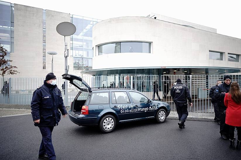 Car Hits Gate Outside Merkel’s Offices