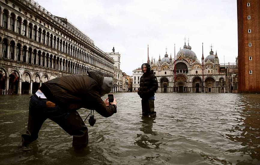 Venice Under Water As Downpours And Wind Take City By Surprise