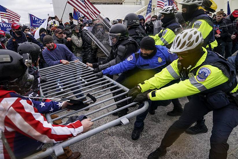 Arkansas Man Accused Of Beating Officer With Flagpole During Capitol Riot