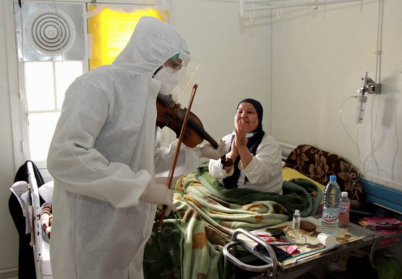 Fiddler On The Wards: Violin-Playing Doctor Cheers Covid Patients In Tunisia