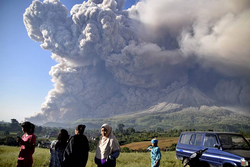 Erupting Indonesian Volcano Covers Villages In Ash