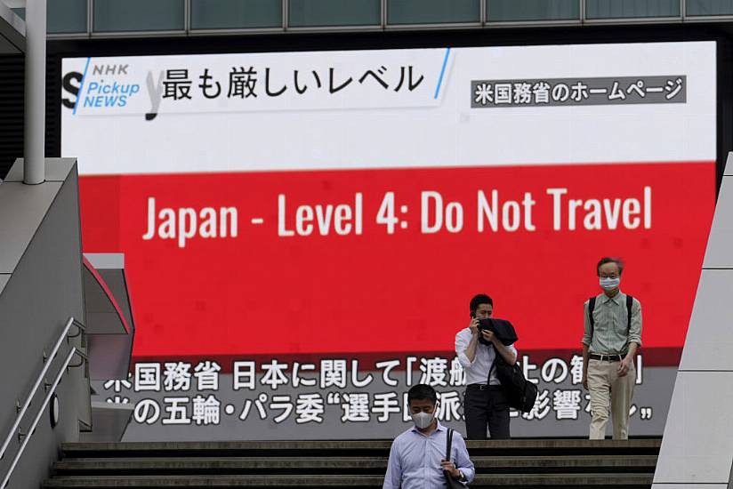 Japan To Extend Virus Emergency In Tokyo Weeks Before Olympics Open