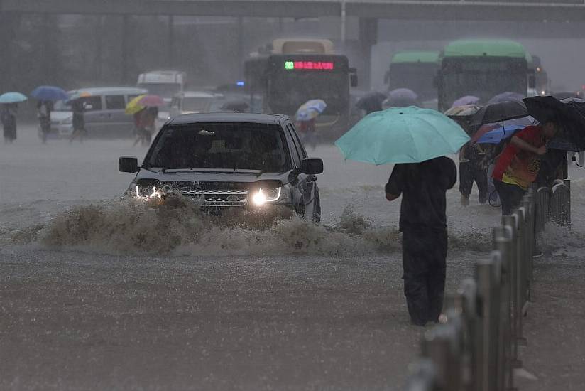 Chinese Military Blasts Dam To Divert Deadly Floodwaters