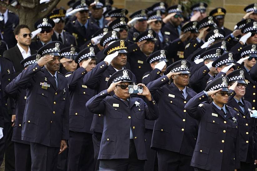 Officers Stand To Attention As Murdered Chicago Policewoman Is Laid To Rest