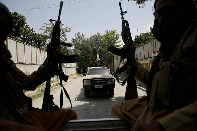 Taliban Co-Founder In Kabul To Hammer Out New Government As Airport Chaos Grows