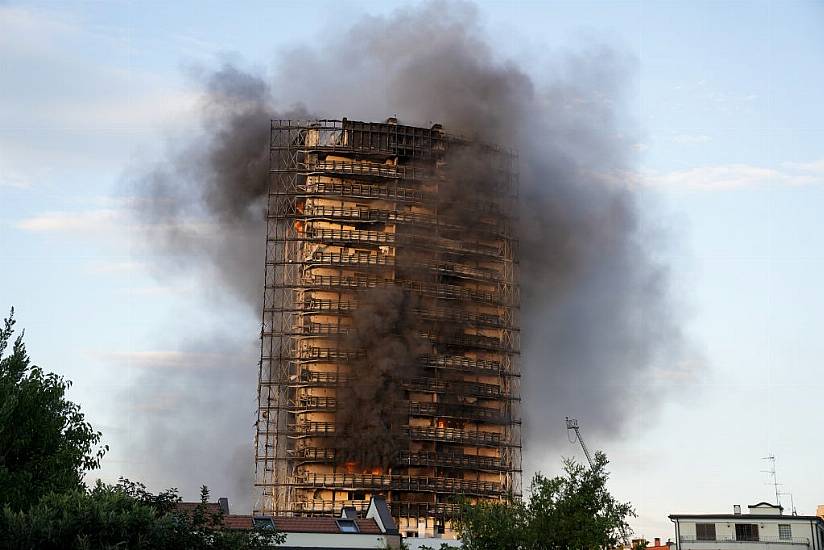 Fire Crews Battle Blaze At Residential Tower Block In Italy