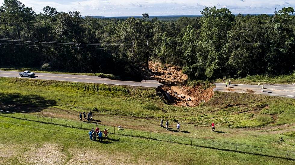 Two Dead As Vehicles Plunge Into Hole After Road Collapses Amid Hurricane Ida