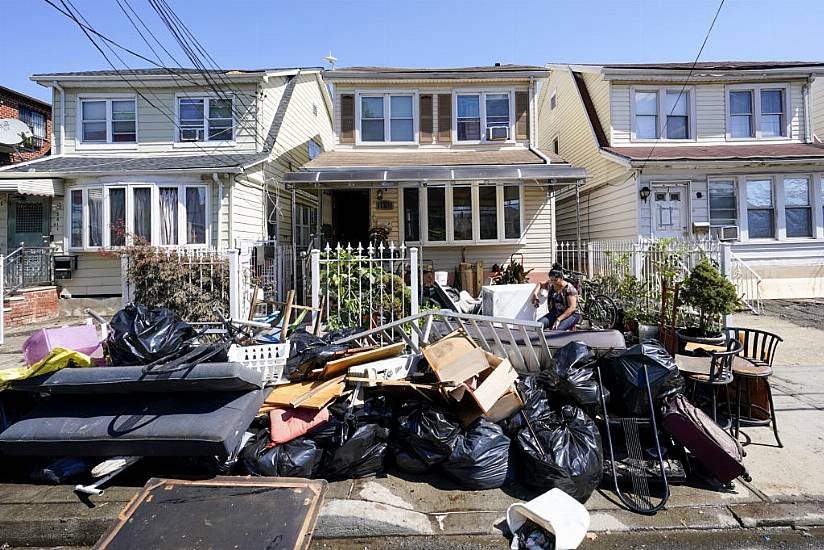 Huge Clean-Up Takes Place After Dozens Killed In Us Floods