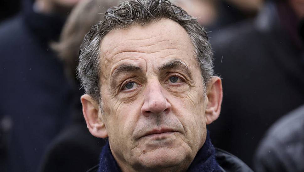 France's Sarkozy Plays Down New Conviction At Paris Book Signing