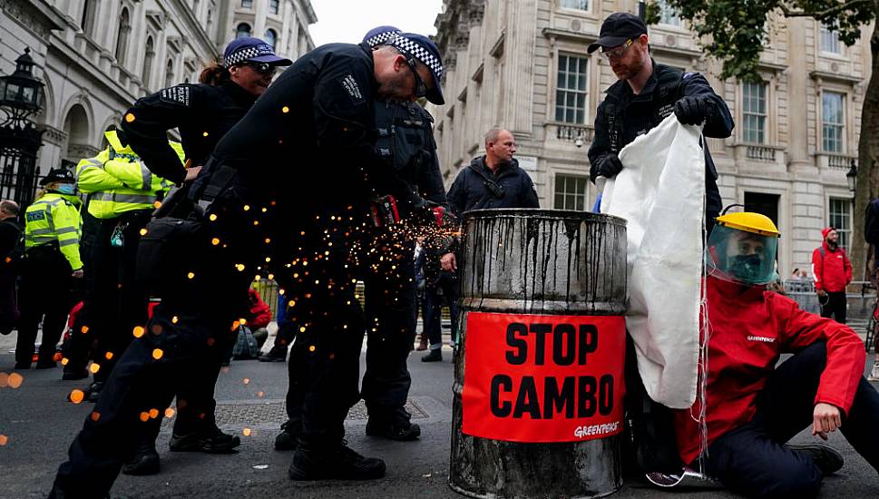 Protesters Erect Statue Of Boris Johnson Splattered In Oil Outside Downing Street