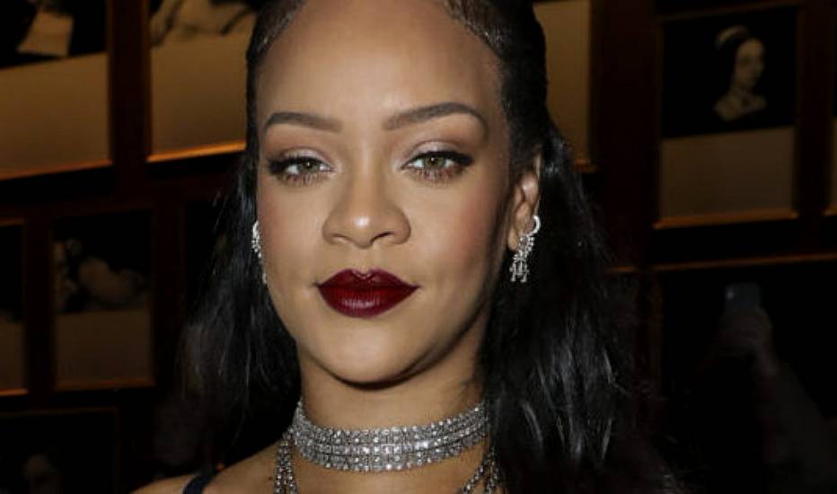 Rihanna Shows Off Baby Bump In Sheer Dior Dress At Paris Fashion Show