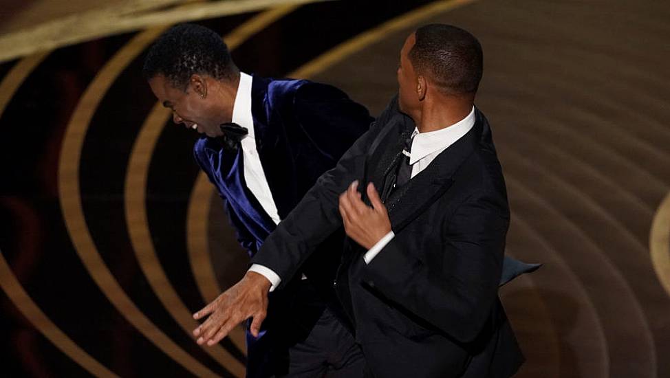 Will Smith Appears To Hit Chris Rock On Oscars Stage After Gag About Wife Jada