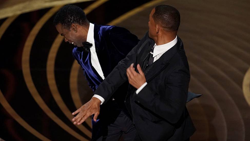 Hollywood Reacts With Shock After Will Smith Hits Chris Rock At Oscars