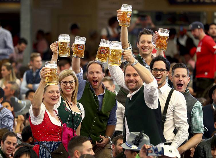 Revellers Raise Their Beer Steins To Return Of Oktoberfest After Pandemic Pause