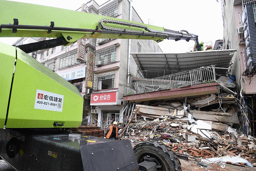 Woman Rescued 50 Hours After China Building Collapse