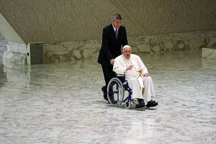 Pope Francis Pictured In A Wheelchair As Knee Pain Continues To Limit Mobility