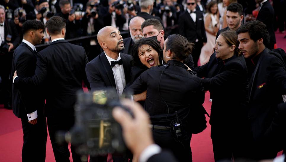 Woman Strips Off In Cannes Red Carpet Protest