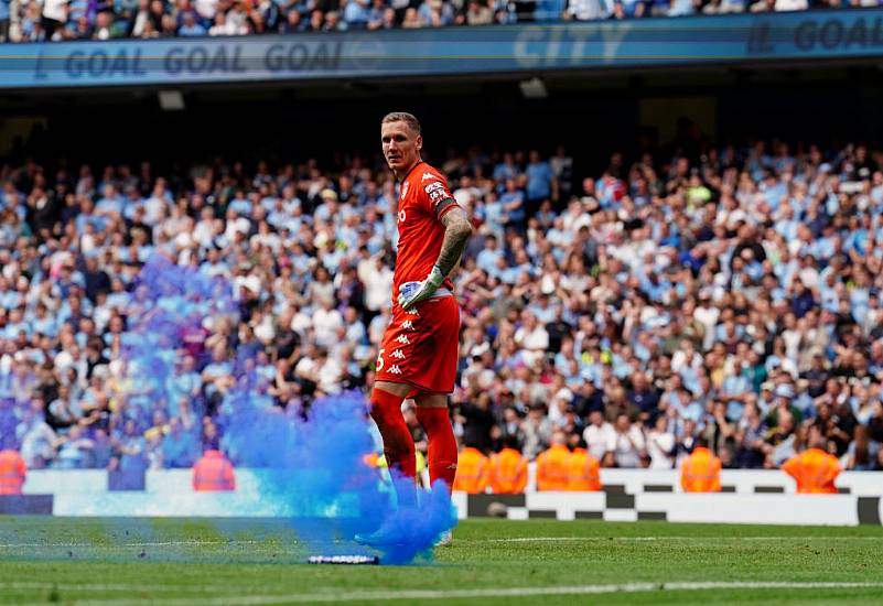 Man City Pledge To Ban Fan After Attack On Robin Olsen During Pitch Invasion