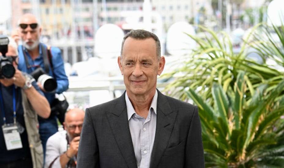 Tom Hanks Reveals Queen Elizabeth's Drink Of Choice Is A Martini