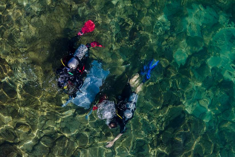 Israeli Divers Haul Rubbish From Ancient Site For Oceans Day