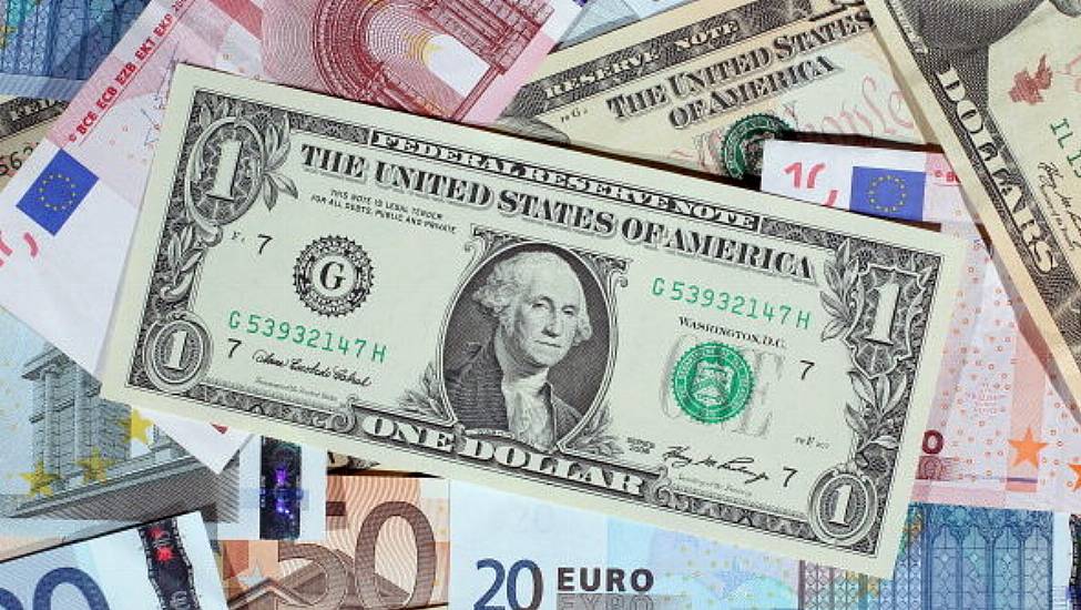 Euro Slips Back Below Parity With Dollar