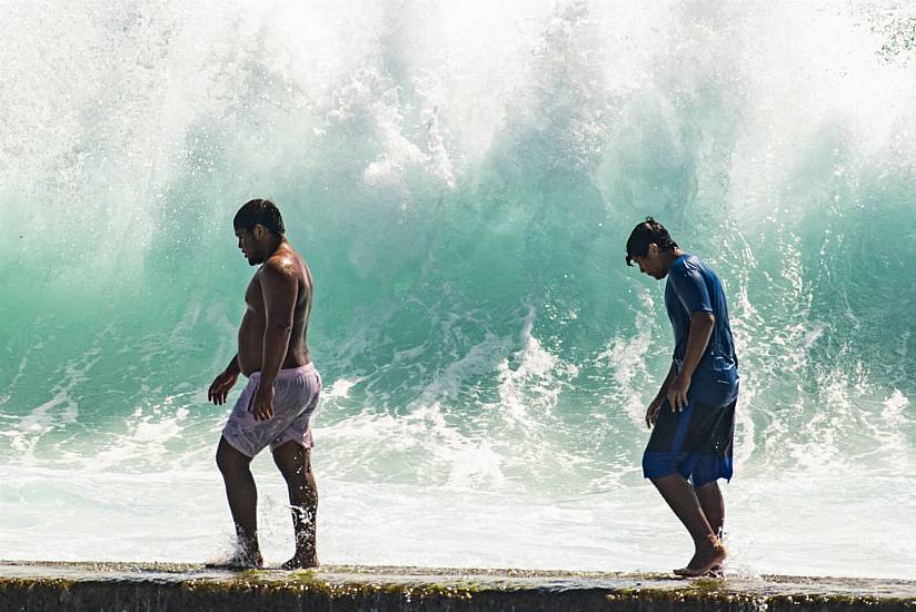 Towering Waves Crash Into Homes And Weddings In Hawaii