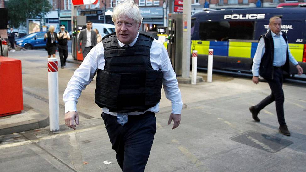 Video Appears To Capture Johnson Taking Part And Speaking To Man In Police Raid