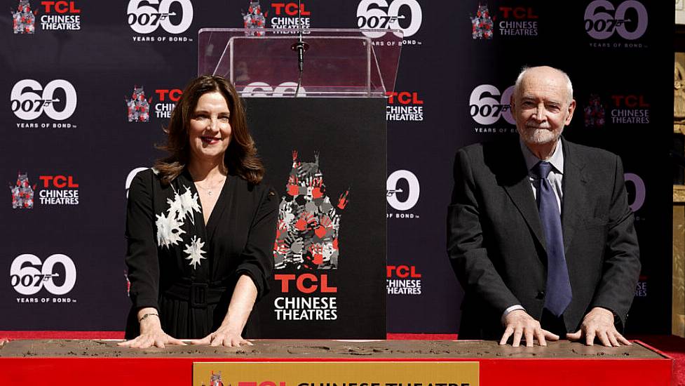 Bond Producers Praise 007 Team As They Cement Their Handprints In Hollywood