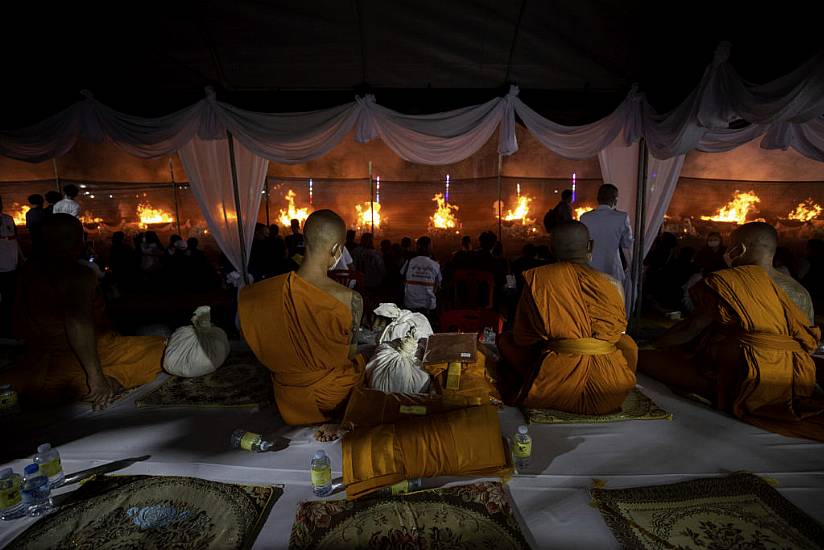 Families Mourn As Thai Massacre Victims Are Cremated