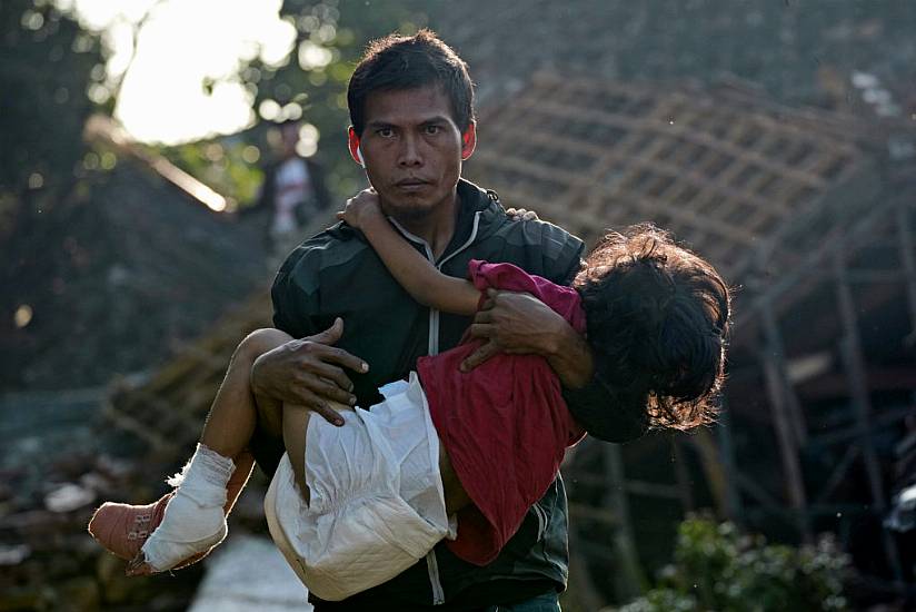 Indonesian Rescuers Focus On Landslide Site As Quake Toll Rises