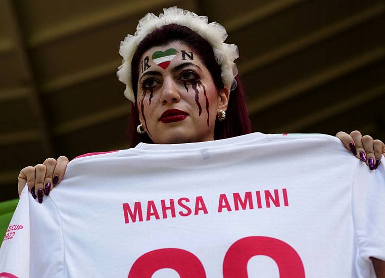 Iran Regime Supporters Confront Protesters Ahead Of World Cup Game Against Wales