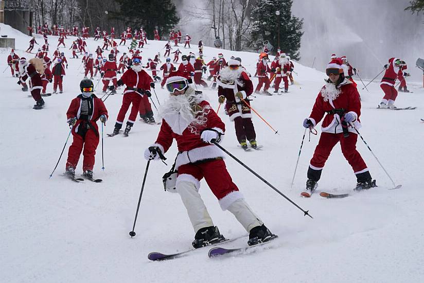 300 Skiing Santas, A Grinch And A Tree Take To Slopes To Spread Christmas Cheer