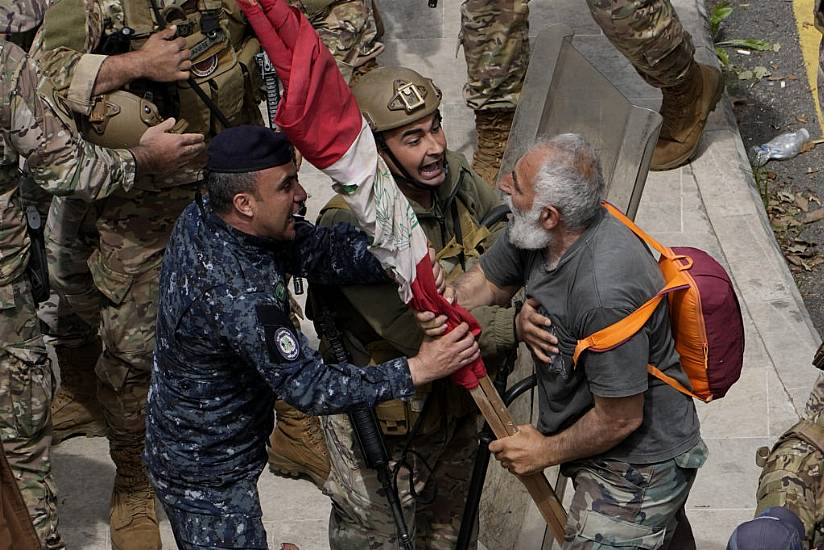 Security Forces Fire Tear Gas As Lebanon Protesters Try To Storm Government Hq