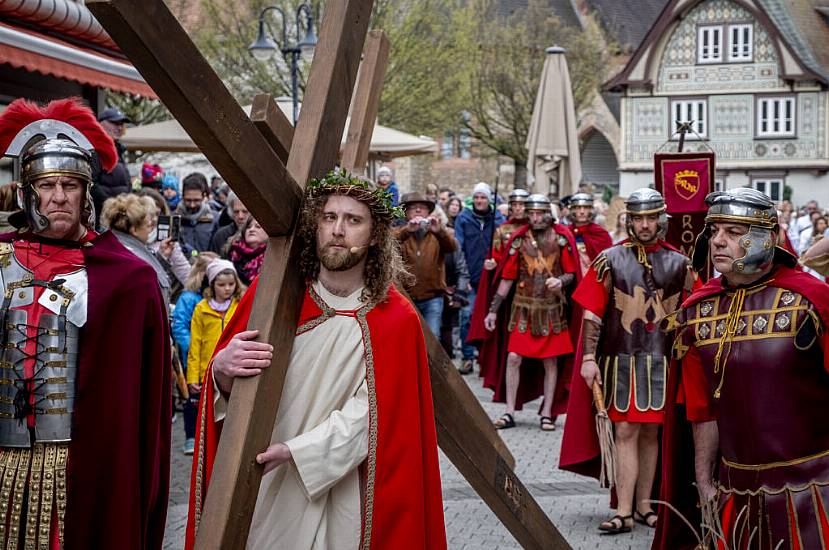 In Pictures: Christians Mark Good Friday With Sombre Ceremonies