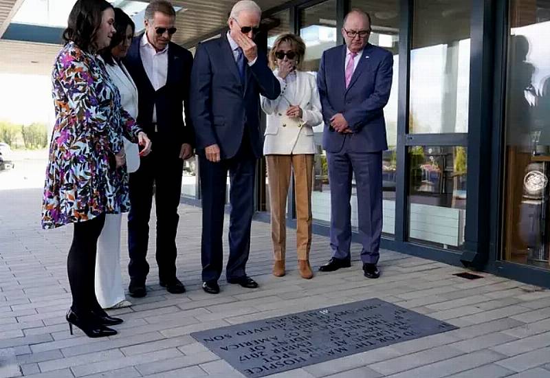 Biden Looks At Plaque In Memory Of Late Son And Meets Distant Cousin At Hospice