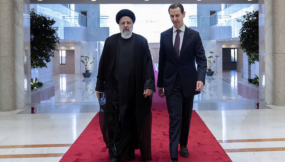 Iranian President Holds Rare Meeting With Assad In Syria