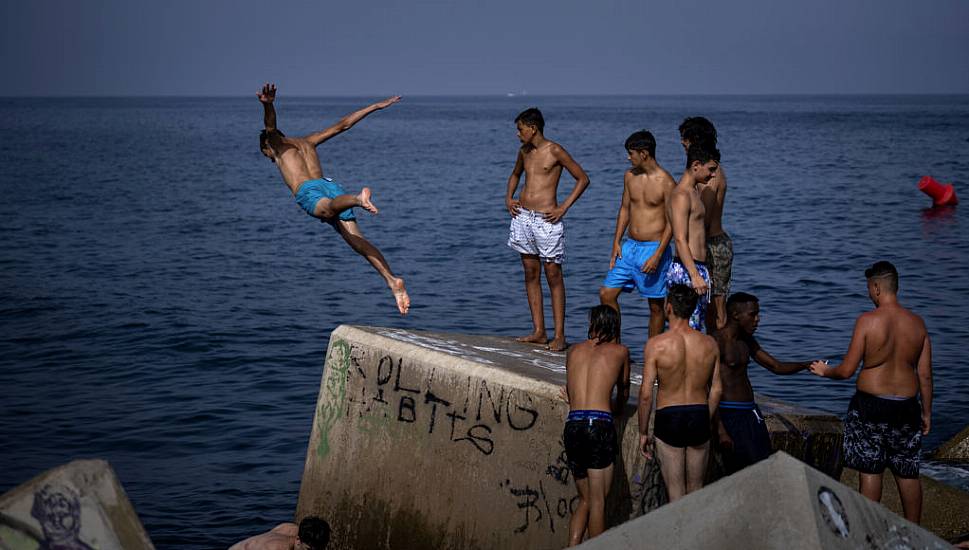 Spain Sweats Out Sultry Nights As Heatwave Bakes Southern Europe