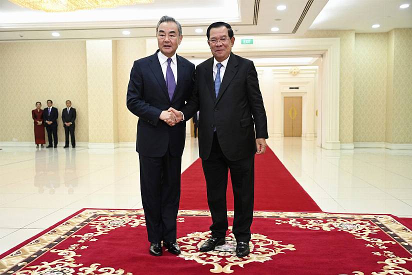 China’s Foreign Minister Visits Cambodia Days After Premier Hands Role To Son