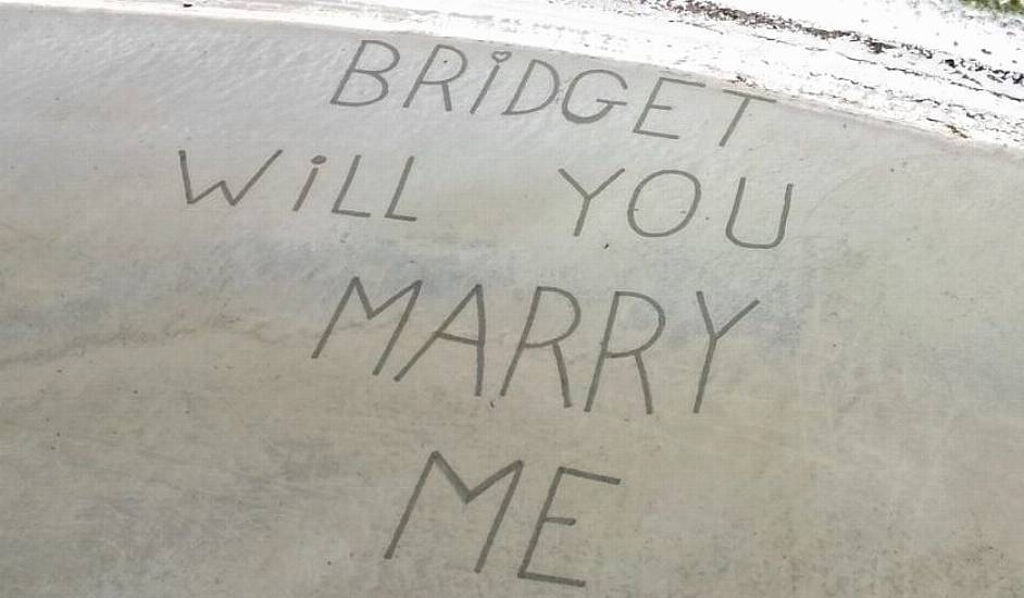 Marriage Proposal Etched Into Runway Sand For Man’s Sky-High Proposal