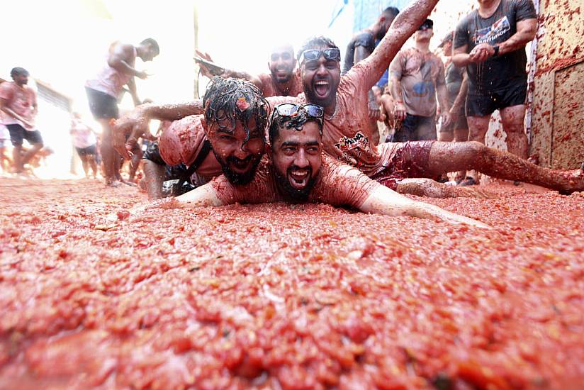 Revellers Hurl Tomatoes At Each Other In Spanish Town’s Tomatina Party