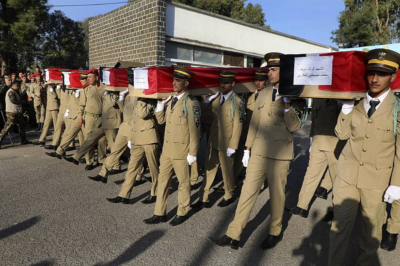 Funerals Held In Syria For Dozens Of Victims Of Attack On Military Ceremony