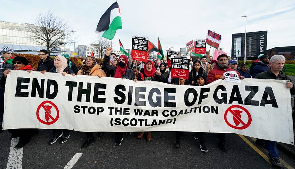 Protesters Hold Up Mock Body Bags In Protest At Gaza War