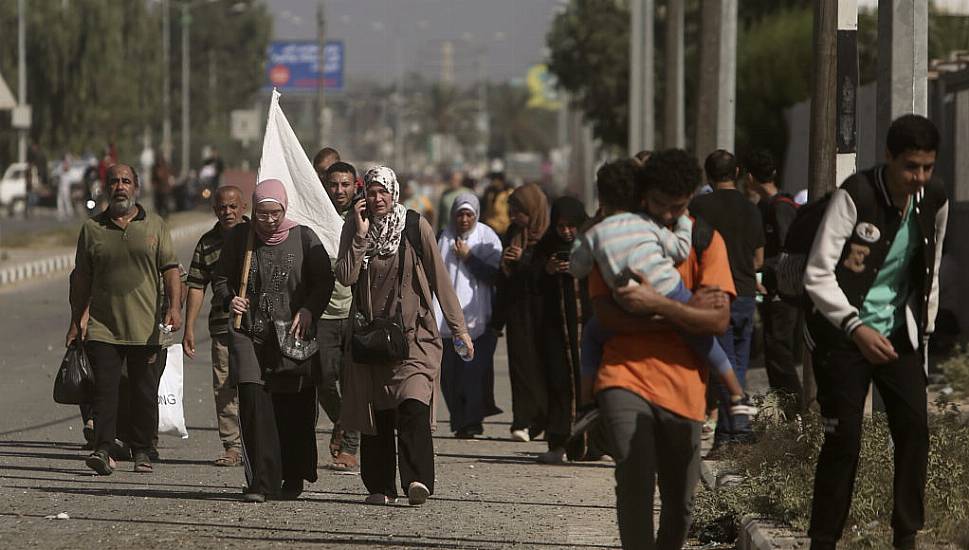 Palestinians Flee On Foot As Israeli Troops Battle Hamas Inside Gaza City