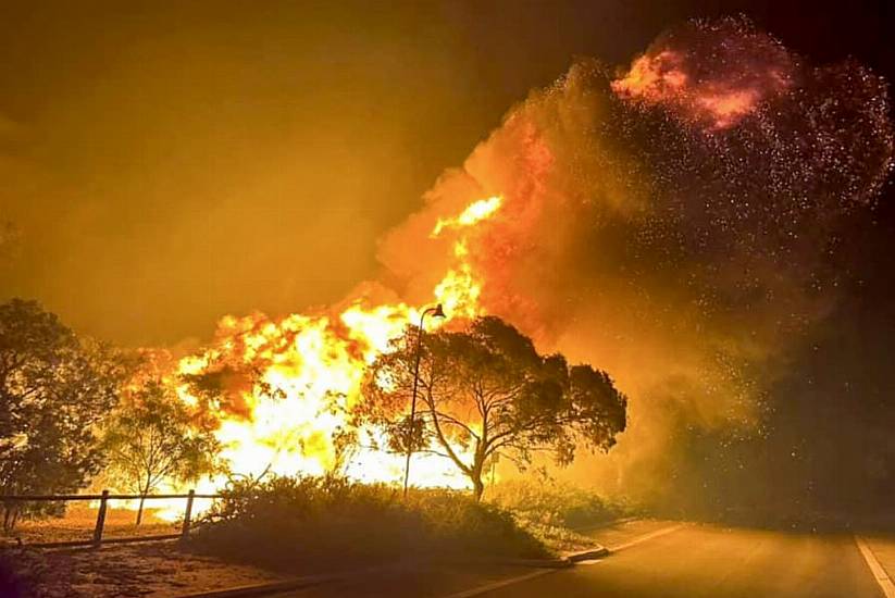 Dozens Evacuated As Australian Wildfire Burns Out Of Control