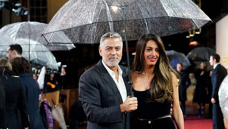 George And Amal Clooney Brave British Rain For Screening Of The Boys In The Boat