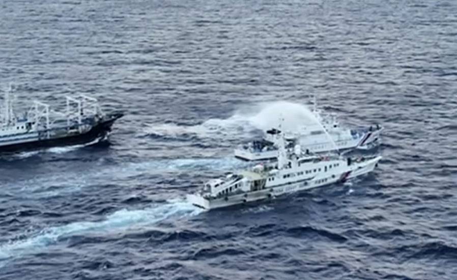 Chinese Coast Guard Ships Blast Philippine Vessels With Water Cannon