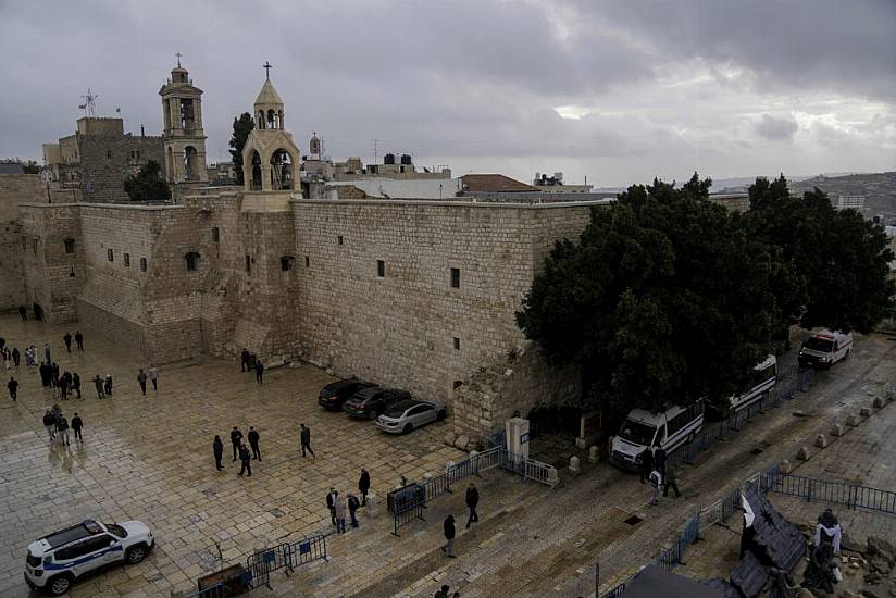 In Pictures: Christmas Celebrations Begin Worldwide But Are Muted In Bethlehem